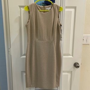 Calvin Klein midi dress in color “oat” (beige), size 12, with gold zipper.